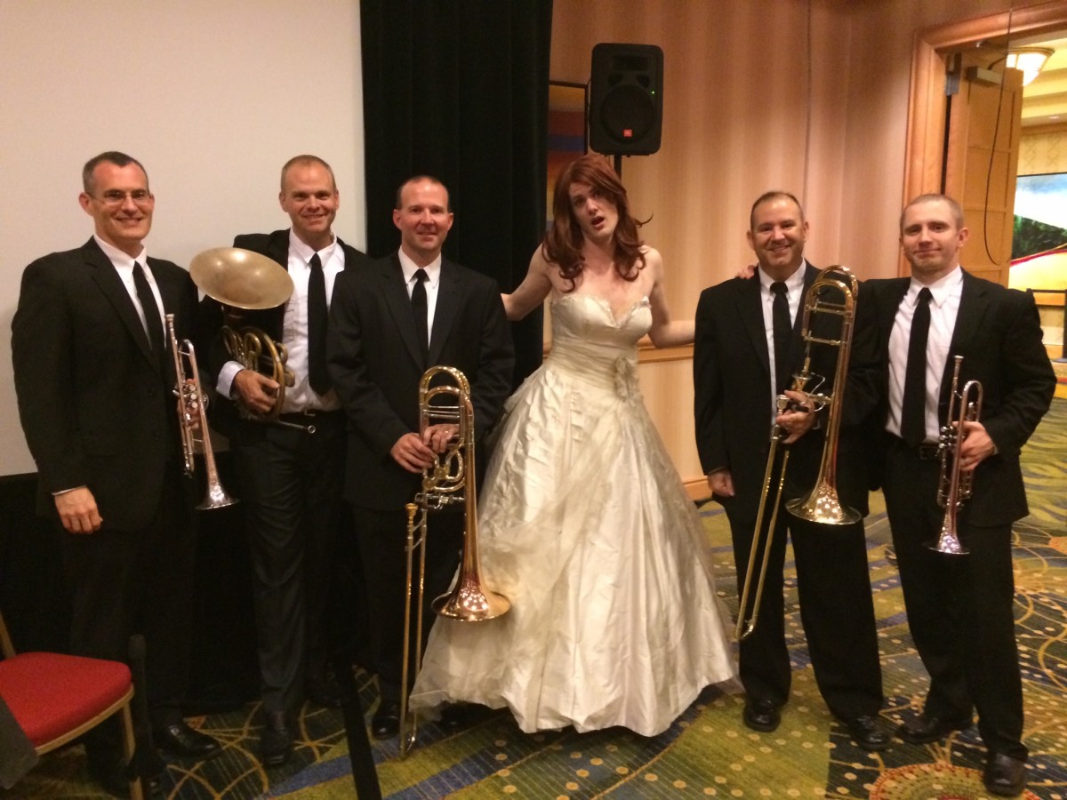 Cartoonist and newlywed Simon Hanselmann with the brass quintet. Photo by Jacq Cohen.